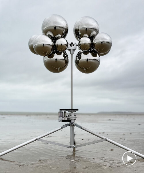 vincent leroy's kinetic mirror cloud floats between earth and sky at normandy beach